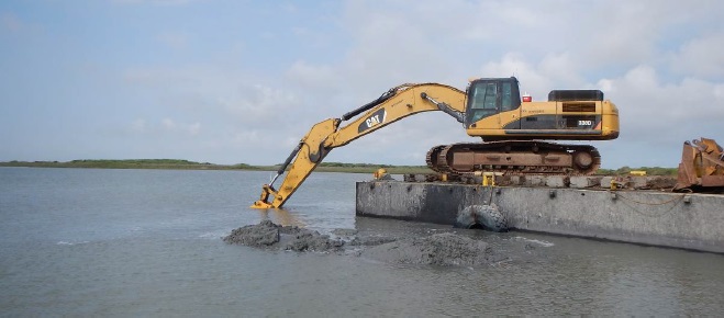 Excavator working at approximate STA 69+00