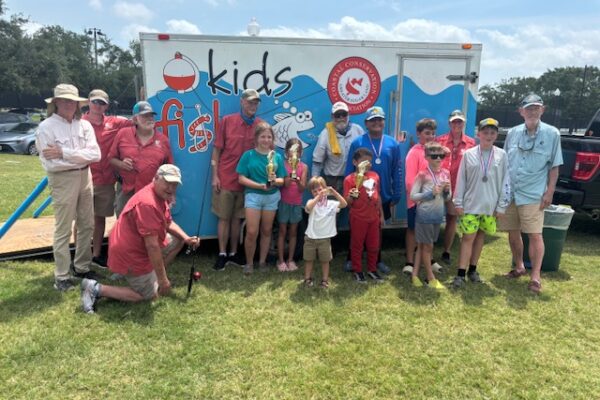 Sienna kid fish board members with winners