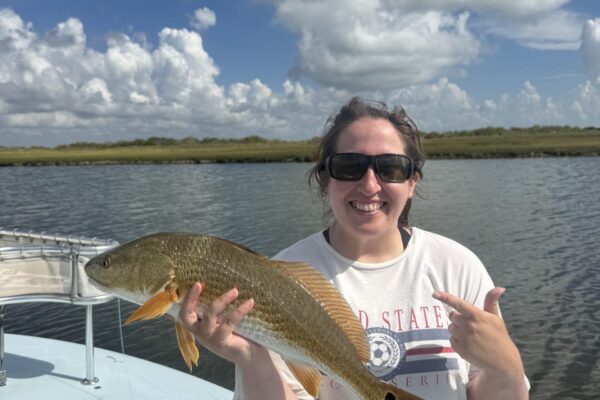 Aransas Bay - Jess Junket with a Redfish on Fly